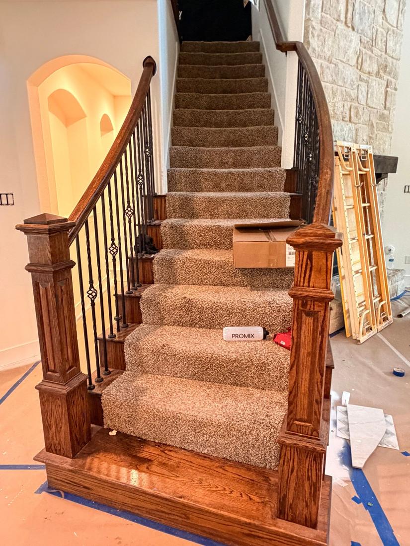 Carpeted staircase before remodel